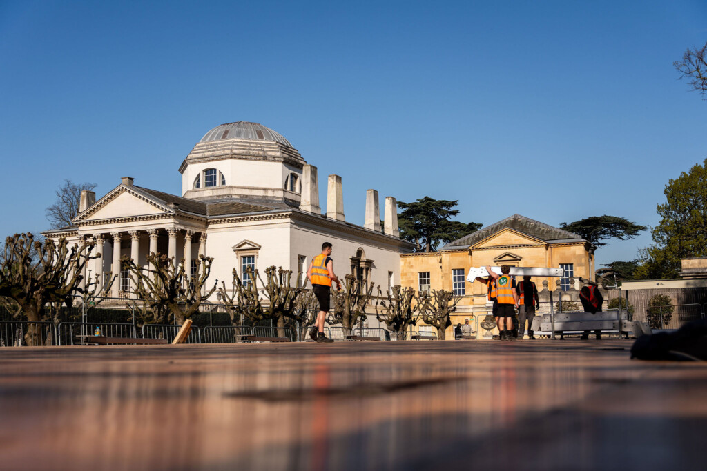 Key Structures team installing a temporary structure floor system at Chiswick House, London, using FloorStak support and levelling components.